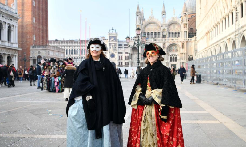 Revelers pose during the Venice Carnival in Venice, Italy, on Feb. 4, 2023. The Venice Carnival 2023 kicked off in the Italian lagoon city on Saturday, and will last until Feb. 21. Photo: Xinhua
