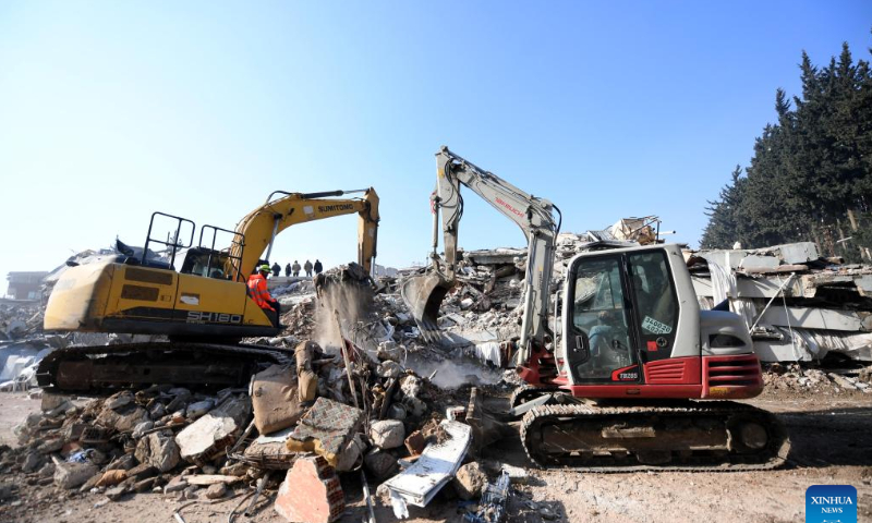 Excavators are seen in rescue operation on earthquake debris in Antakya in the southern province of Hatay, Türkiye, Feb. 12, 2023. Photo: Xinhua