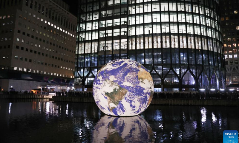 This photo taken on Jan. 27, 2023 shows a light installation titled Floating Earth during a winter light show at Canary Wharf in London, Britain. Photo: Xinhua