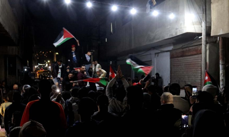 People take part in a protest against Israeli soldiers' killing of nine Palestinians in Amman, Jordan, on Jan. 26, 2023. Israeli forces killed on Thursday at least nine Palestinians, including an elderly woman, during a raid in the occupied West Bank, Palestinian sources said, amid escalating violence in the region. Photo: Xinhua