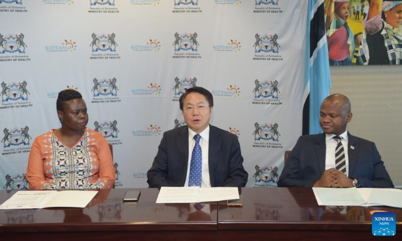 Chinese Ambassador to Botswana Wang Xuefeng (C) addresses the media during the handover ceremony of personal protective equipment and reproductive health products donated by China in Gaborone, Botswana on Jan. 27. 2023. China on Friday donated personal protective equipment (PPE) and reproductive health products to Botswana. Photo: Xinhua