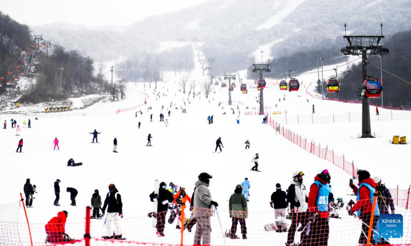 People have fun at a ski resort in Jilin, northeast China's Jilin Province, Jan. 23, 2023. (Xinhua/Xu Chang)