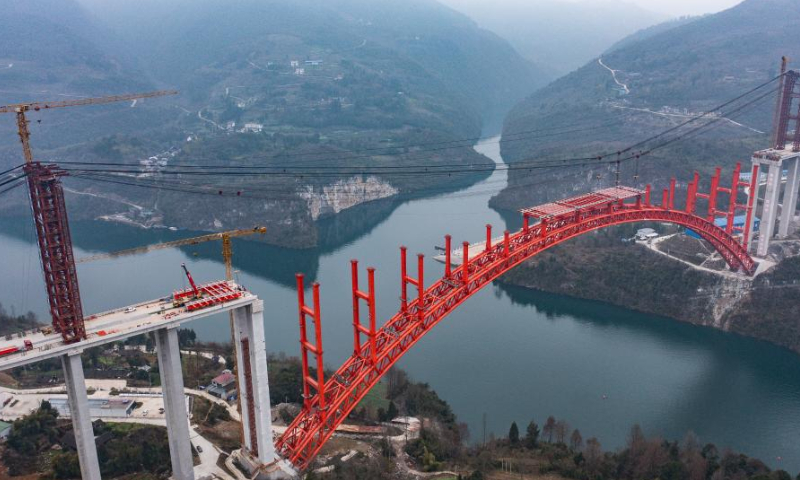 This aerial photo taken on Feb. 17, 2023 shows the construction site of Wujiang grand bridge, a main project on the expressway linking Dejiang and Yuqing, in southwest China's Guizhou Province. The bridge, located at the junction of Sinan, Shiqian and Fenggang counties of Guizhou Province, features a length of 1,834 meters and a span of 504 meters. Photo: Xinhua