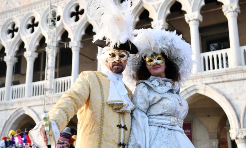 Revelers pose during the Venice Carnival in Venice, Italy, on Feb. 4, 2023. The Venice Carnival 2023 kicked off in the Italian lagoon city on Saturday, and will last until Feb. 21. Photo: Xinhua