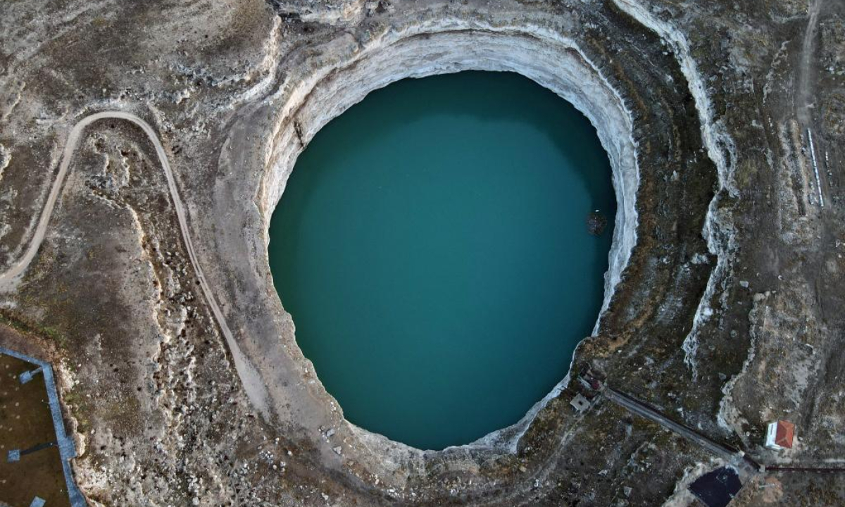 This aerial photo taken on Jan 28, 2023 shows sinkholes in Konya, Türkiye. The number of sinkholes is alarmingly increasing in Türkiye's drought-stricken central Konya province, putting farmers' livelihoods in danger amid uncontrolled water use. Photo:Xinhua