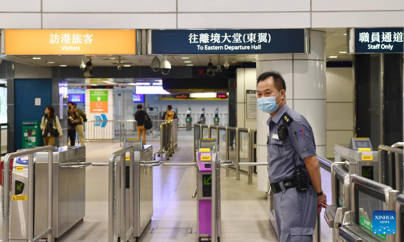 A staff member is on duty at the Lo Wu Station of Hong Kong's Mass Transit Railway (MTR) in Hong Kong, south China, Feb. 3, 2023. Photo: Xinhua