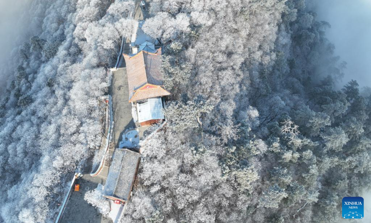 This aerial photo taken on Feb 10, 2023 shows rime scenery at Jingzhong mountain in Qianxi County, north China's Hebei Province. Photo:Xinhua