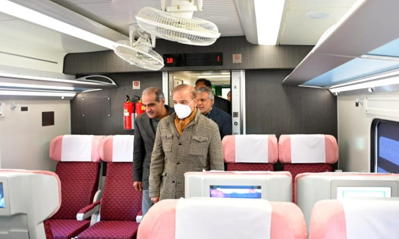 Pakistani Prime Minister Shahbaz Sharif (Front) visits an imported train coach from China at a railway station in Islamabad, Pakistan, on Jan. 27, 2023. Sharif said on Friday that the newly imported train coaches from China will help Pakistan Railways to attract passengers and increase revenue. Photo: Xinhua