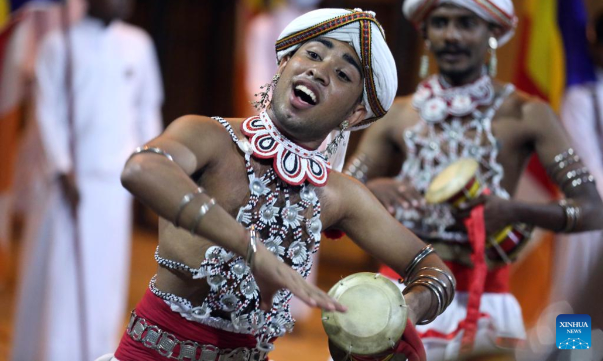 Dancers perform at a celebration during the Duruthu Perahera festival at a temple in Kelaniya, Sri Lanka, on Jan 5, 2023. Photo:Xinhua