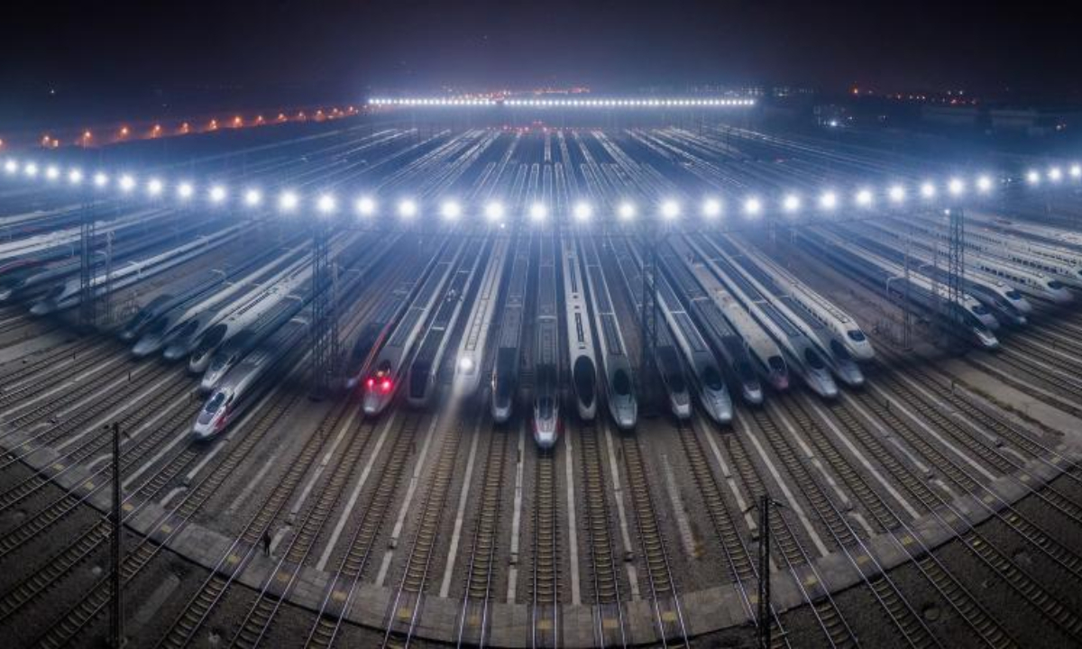 This stitched panoramic aerial photo shows bullet trains in a maintenance base in Wuhan, central China's Hubei Province, Jan 7, 2023. Photo:Xinhua