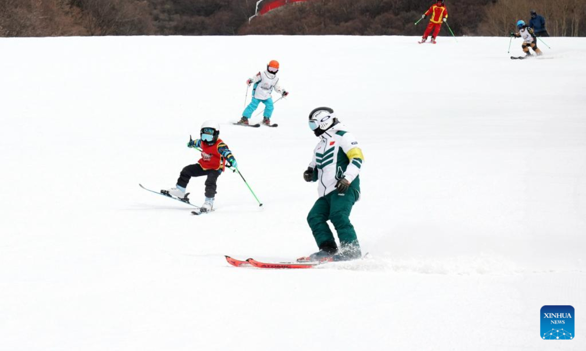 People enjoy skiing at National Alpine Skiing Centre in Yanqing District, Beijing, capital of China, Feb 2, 2023. Photo:Xinhua