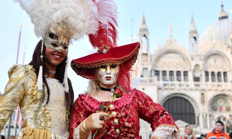 Revelers pose during the Venice Carnival in Venice, Italy, on Feb. 4, 2023. The Venice Carnival 2023 kicked off in the Italian lagoon city on Saturday, and will last until Feb. 21. Photo: Xinhua
