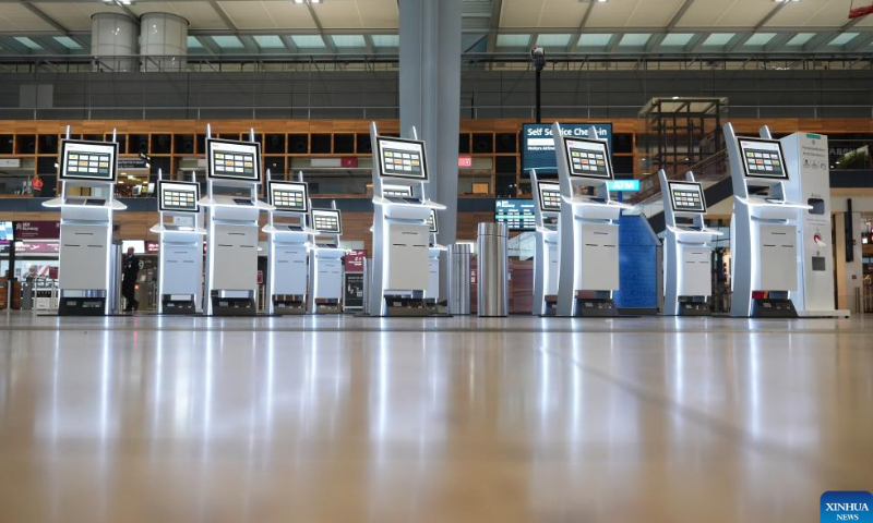 Self-service check-in machines are placed at a terminal of Berlin Brandenburg Airport in Schoenefeld, Germany, Jan. 25, 2023. All passenger flights at Berlin Brandenburg Airport were canceled or delayed on Wednesday due to a strike by airport workers, estimated to affect about 35,000 passengers. Photo: Xinhua