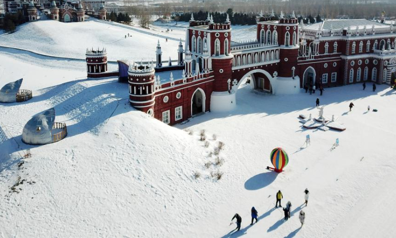 People visit the Volga Manor in Harbin, northeast China's Heilongjiang Province, Jan. 26, 2023. The Volga Manor, a Russian culture-themed park, turned into an ice and snow world during the Spring Festival, attracting lots of visitors. Photo: Xinhua