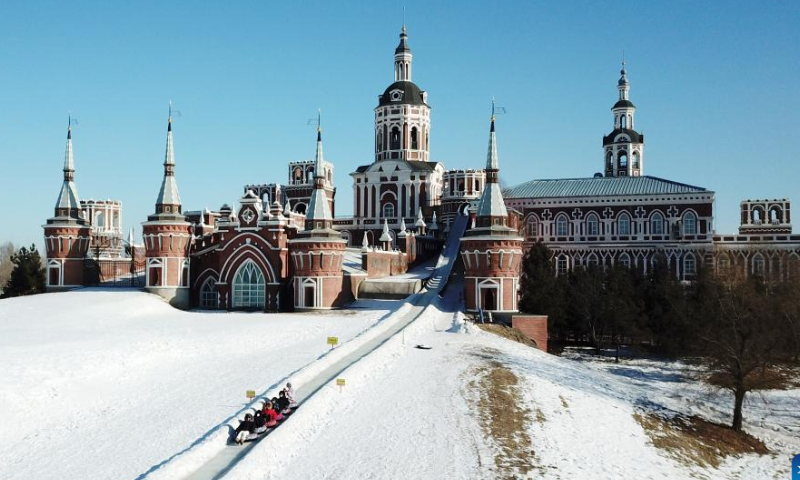People visit the Volga Manor in Harbin, northeast China's Heilongjiang Province, Jan. 26, 2023. The Volga Manor, a Russian culture-themed park, turned into an ice and snow world during the Spring Festival, attracting lots of visitors. Photo: Xinhua
