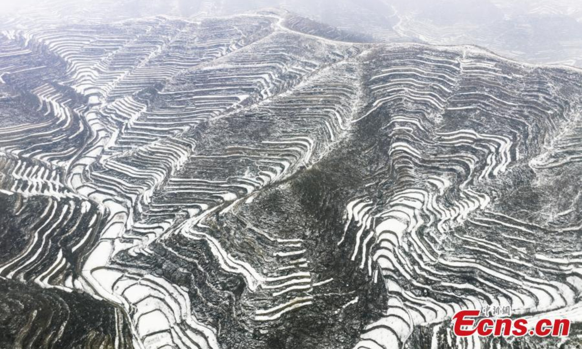 Aerial view shows snow-covered terraced fields in Wu'an city, north China's Hebei Province, Feb 9, 2023. Photo:Xinhua
