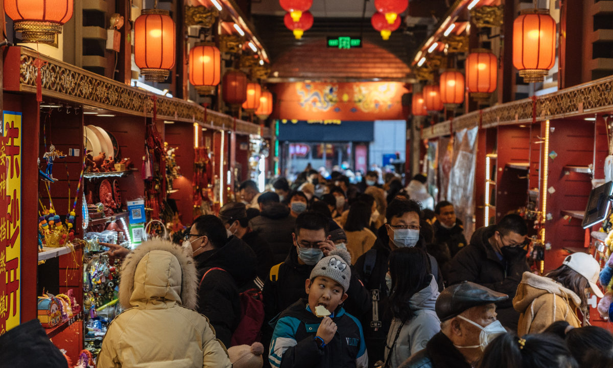 Beijing's landmark Qianmen Street is packed with tourists on the first day of the Chinese Lunar New Year, which falls on January 22 this year. Photo: Li Hao/GT