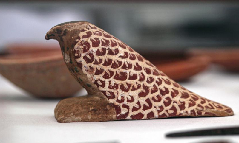 Photo taken on Jan. 26, 2023 shows a bird-like statue unearthed from a newly-discovered ancient tomb in Saqqara necropolis, south of Cairo, Egypt. Egypt's renowned archeologist Zahi Hawass on Thursday announced the discovery of 