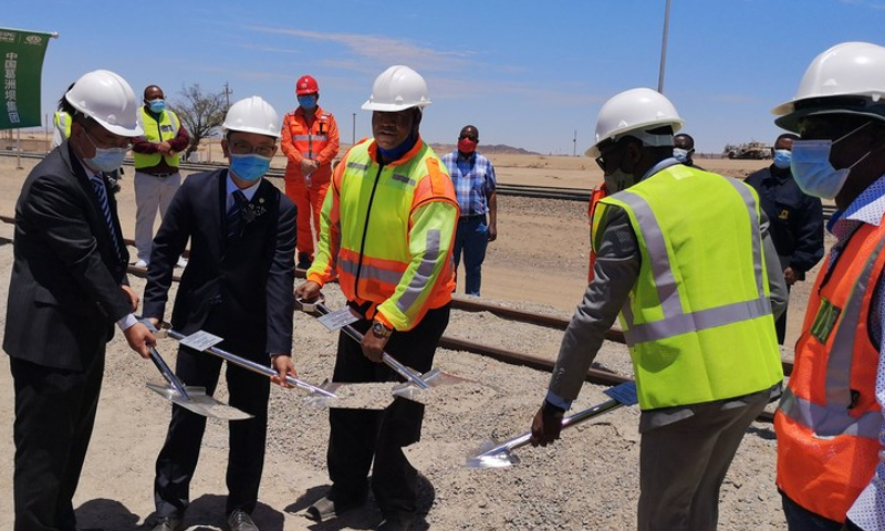 Officials from Namibian Ministry of Works and Transport and China Gezhouba Group Corporation in Namibia break ground for the project of the rehabilitation and upgrading of the railway line between Walvis Bay and Arandis in Arandis, western Namibia, on November 30, 2020. Photo: Xinhua