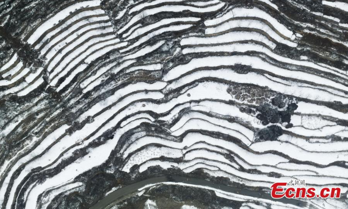 Aerial view shows snow-covered terraced fields in Wu'an city, north China's Hebei Province, Feb 9, 2023. Photo:Xinhua