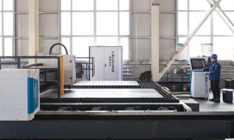 An employee works at the Heihe Liyuanda Special Automobile Manufacturing Co., Ltd. in the Heihe Area of China (Heilongjiang) Pilot Free Trade Zone in northeast China's Heilongjiang Province, Feb. 11, 2023. Recently, enterprises in the Heihe Area of China (Heilongjiang) Pilot Free Trade Zone have been busy with production to meet the orders and to make a good start in the first quarter of 2023. Photo: Xinhua