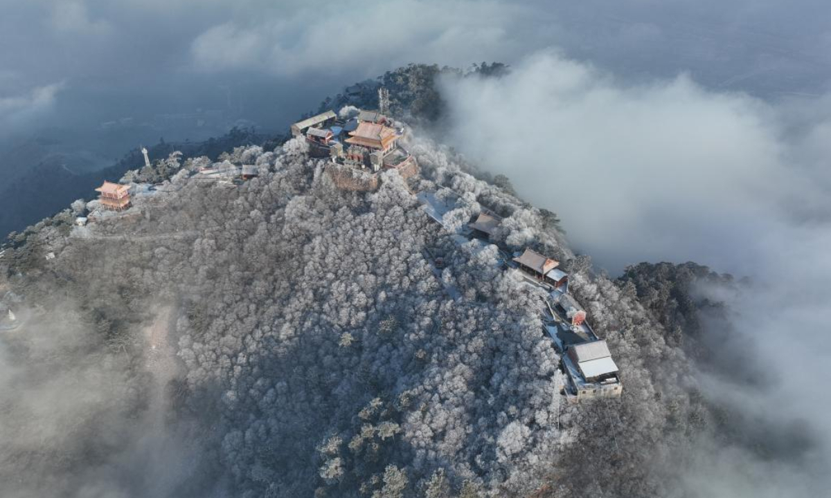 This aerial photo taken on Feb 10, 2023 shows rime scenery at Jingzhong mountain in Qianxi County, north China's Hebei Province. Photo:Xinhua