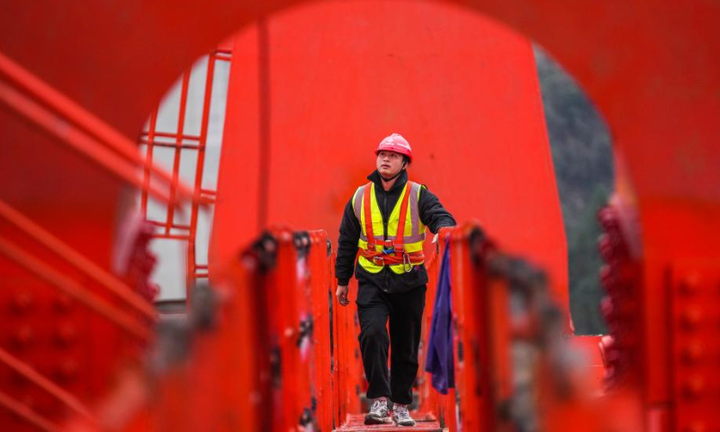 A worker is pictured at the construction site of Wujiang grand bridge, a main project on the expressway linking Dejiang and Yuqing, in southwest China's Guizhou Province, Feb. 16, 2023. The bridge, located at the junction of Sinan, Shiqian and Fenggang counties of Guizhou Province, features a length of 1,834 meters and a span of 504 meters. Photo: Xinhua
