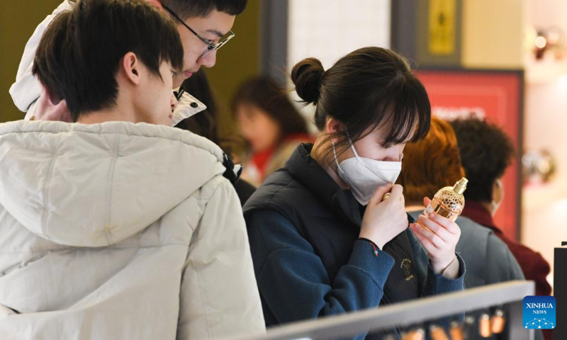 People shop at Haikou Riyue Plaza Duty Free Shop in Haikou, south China's Hainan Province, Jan. 25, 2023. (Xinhua/Yang Guanyu)
