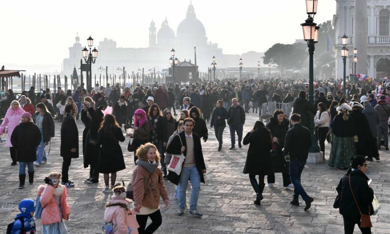 Tourists attend the Venice Carnival in Venice, Italy, on Feb. 4, 2023. The Venice Carnival 2023 kicked off in the Italian lagoon city on Saturday, and will last until Feb. 21. Photo: Xinhua