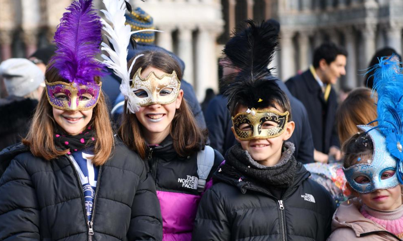 Revelers pose during the Venice Carnival in Venice, Italy, on Feb. 4, 2023. The Venice Carnival 2023 kicked off in the Italian lagoon city on Saturday, and will last until Feb. 21. Photo: Xinhua