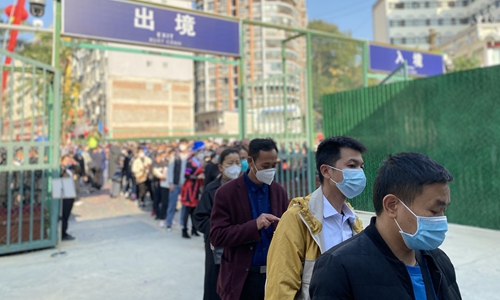 Passengers pass through the Hekou port, a major land port in Southwest China's Yunnan Province adjacent to Vietnam, on January 8, 2023, the first day of China's downgraded COVID-19 management. Photo: Li Qiaoyi/GT 