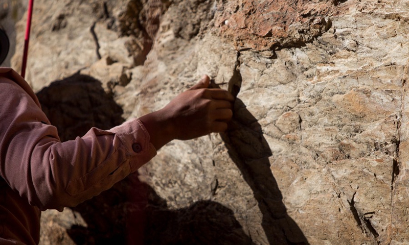 A visually impaired person participates in a rock climbing event organized for the first time for visually impaired people on the outskirts of Kathmandu, Nepal on Jan. 7, 2023. (Photo by Sulav Shrestha/Xinhua)