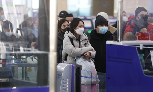 Passengers pass the customs check at Erenhot Port on Sunday as downgraded COVID-19 management was implemented on passengers. Photo: Cui Meng/GT