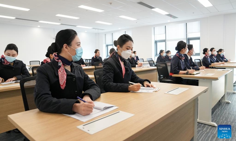 Flight attendants of China Eastern Airlines' C919 attend a training course by COMAC Shanghai Aircraft Customer Service Co., Ltd. in Shanghai, east China, Jan. 6, 2023. Flight attendants of China Eastern Airlines have attended intensive training for the C919 to ensure smooth operation of the aircraft. (Xinhua/Ding Ting)