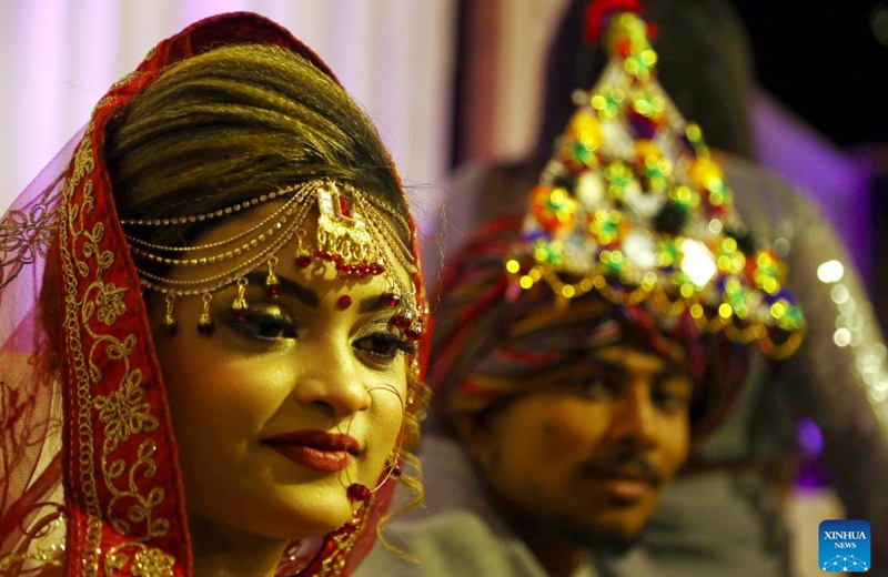 A bride and a groom are seen during a mass wedding ceremony in southern Pakistani port city of Karachi on Jan. 8, 2023. Photo: Xinhua