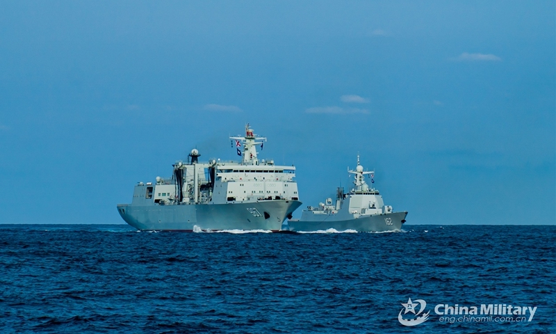 The comprehensive supply ship Chaganhu (Hull 967) executes underway replenishment-at-sea alongside with the guided-missile destroyer <em>Nanning</em> (Hull 162) during a four-day-long realistic-combat training exercise in waters of the South China Sea recently. They are attached to a destroyer flotilla with the navy under the PLA Southern Theater Command. (Photo: eng.chinamil.com.cn)
