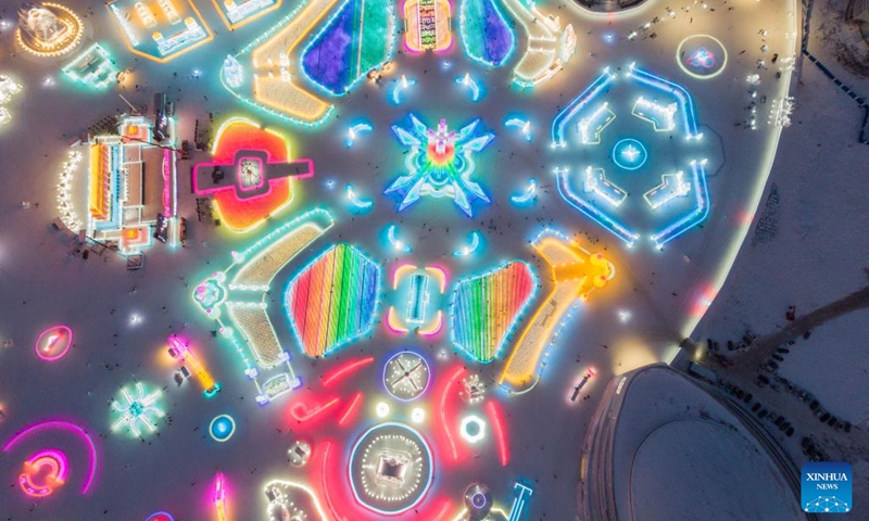 This aerial photo taken on Jan. 3, 2023 shows the Harbin Ice-Snow World theme park in Harbin, northeast China's Heilongjiang Province. Harbin is famous for its rich ice and snow resources. This winter, the city opened three ice and snow-themed parks, launched 12 ice and snow experience products and 10 such tourism routes, and created more than 100 related activities to promote the development of winter tourism, culture, fashion and sports. (Xinhua/Xie Jianfei)