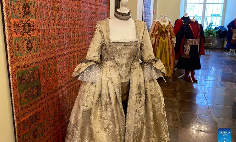 Traditional costumes are on display at the Lithuanian and Polish Traditional Costume Exhibition in Vilnius, Lithuania, Jan. 11, 2023. The exhibition, displaying the two countries' traditional costumes and tapestries, was jointly organized by the national cultural heritage departments of Lithuania and Poland.(Photo: Xinhua)