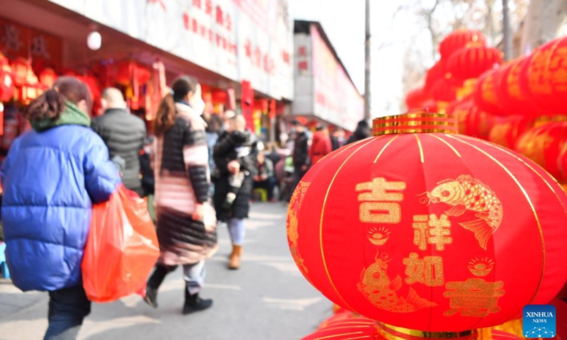 Lanterns are seen for sale at a market in Xi'an, northwest China's Shaanxi Province, Jan. 10, 2023. As the Spring Festival approaches, major Spring Festival shopping markets in Xi 'an are bustling.(Photo: Xinhua)