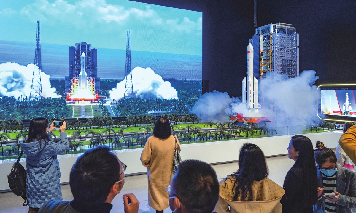Visitors watch a rocket launch on the big screen at the China Space Museum in Beijing on November 16, 2022. Photo: VCG 