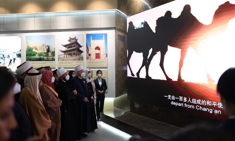 A delegation consisting of more than 30 Islamic figures and scholars from 14 countries, including the UAE, Saudi Arabia and Egypt, visits a museum during their trip to China's Xinjiang region on January 8. Photo: Fan Lingzhi/GT