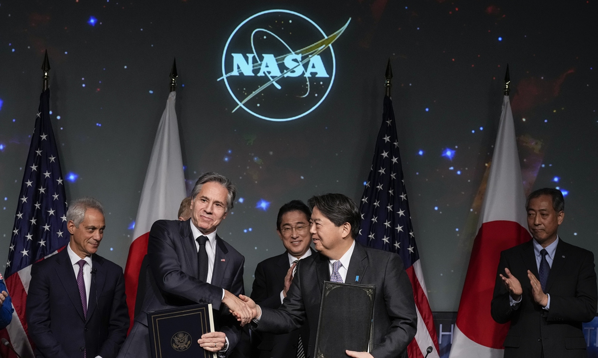 US Secretary of State Antony Blinken and Japanese Foreign Minister Yoshimasa Hayashi shake hands after signing the US-Japan Space Cooperation Framework Agreement at NASA headquarters January 13, 2023 in Washington, DC. Photo: VCG