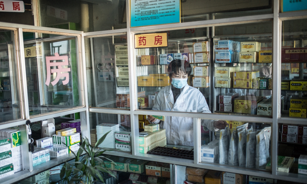 Traditional Chinese Medicine is used to help relieve symptoms caused by COVID-19 infections at a grassroots clinic in a small county of Juye, East China's Shandong Province on January 28. Photo: Shan Jie/GT
