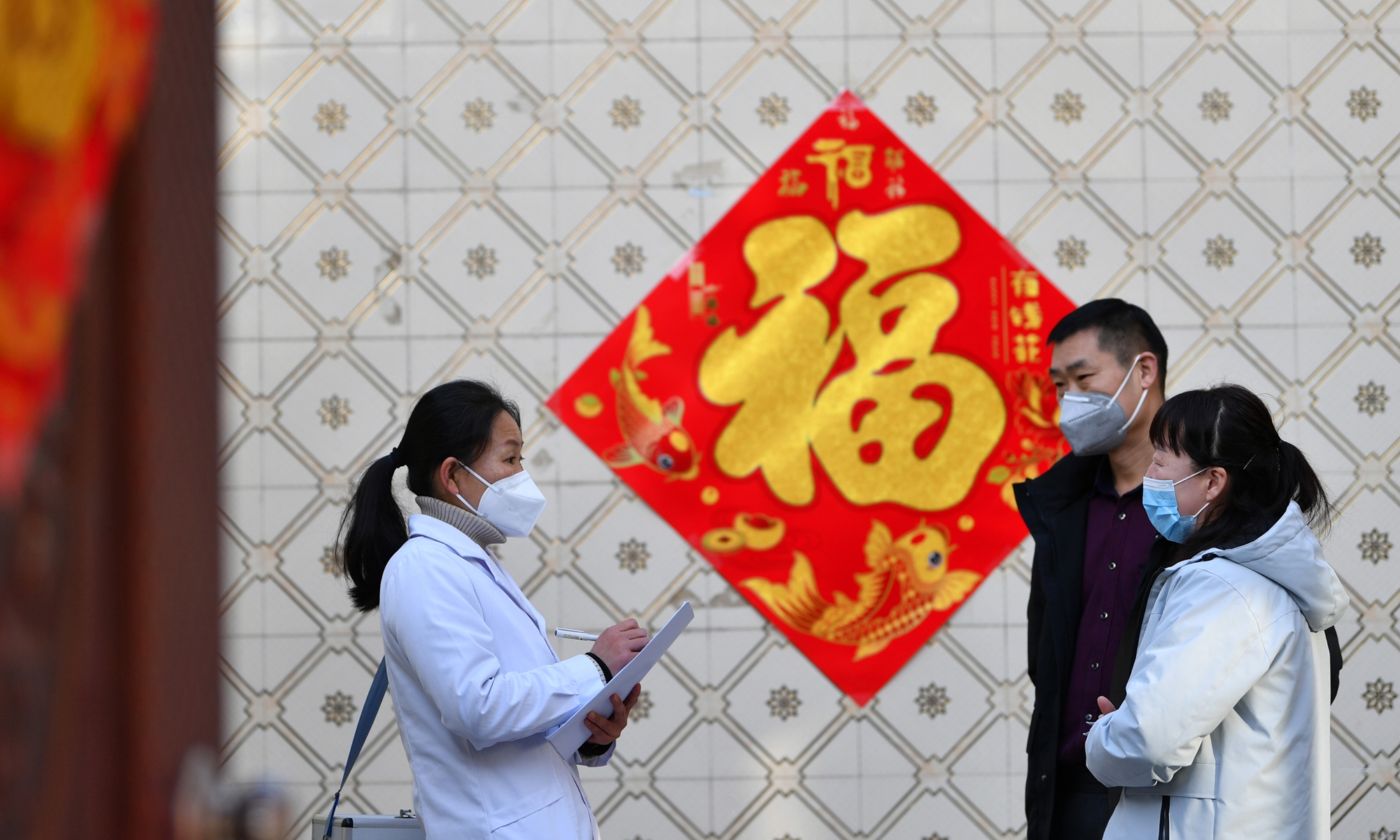 A rural doctor follows up with residents to check their health condition in rural area of North China's Shijiazhuang on January 21, 2023. Photo: VCG