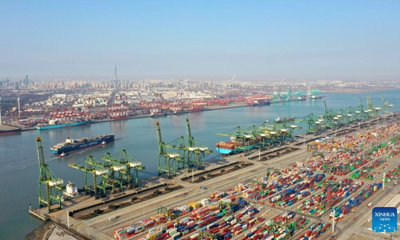 This aerial photo taken on Jan. 10, 2023 shows a container terminal at the Tianjin Port in north China's Tianjin. People's social and economic activities gradually return to normal after China's optimization of its COVID-19 response measures. (Xinhua/Zhao Zishuo)