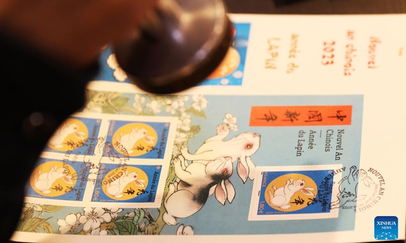 The Year of the Rabbit commemorative stamps, designed by Chinese artist Chen Jianghong, are seen during a launching ceremony in Paris, France, Jan. 14, 2023. (Xinhua/Gao Jing)