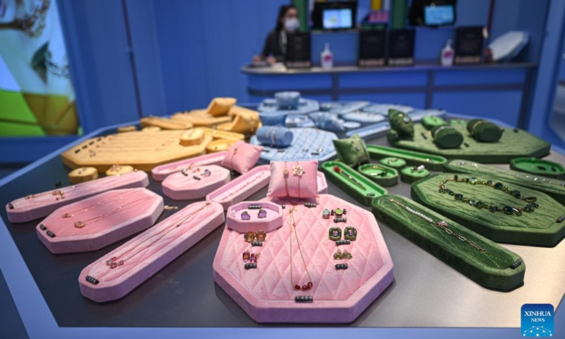 Products are displayed at a duty-free shop in Haikou, south China's Hainan Province, Dec. 17, 2022. After exceeding 100 billion yuan (about $14.92 billion) for the first time in 2021, the total import and export value of Hainan Free Trade Port exceeded 200 billion yuan (about $29.84 billion) to reach 200.95 billion yuan (about $29.98 billion) in 2022, an increase of 36.8 percent. (Xinhua/Pu Xiaoxu)