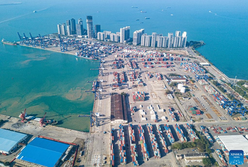 This aerial photo taken on Jan. 13, 2023 shows a view of the container terminal of Haikou Port in Haikou, south China's Hainan Province. After exceeding 100 billion yuan (about $14.92 billion) for the first time in 2021, the total import and export value of Hainan Free Trade Port exceeded 200 billion yuan (about $29.84 billion) to reach 200.95 billion yuan (about $29.98 billion) in 2022, an increase of 36.8 percent. (Xinhua/Pu Xiaoxu)