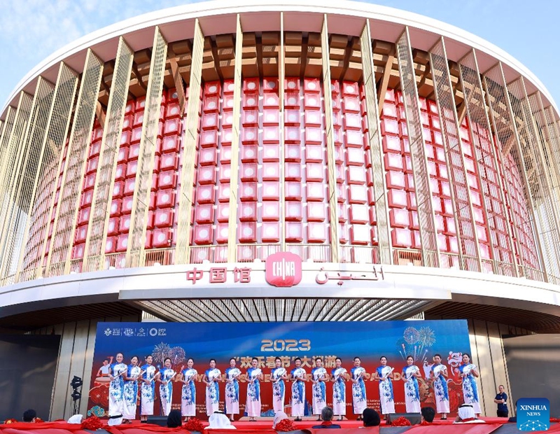 People perform in front of the China Pavilion at Expo City Dubai in Dubai, the United Arab Emirates (UAE), Jan. 14, 2023. Thousands of spectators witnessed a grand parade celebrating the upcoming Chinese New Year on Saturday at Expo City Dubai in the United Arab Emirates (UAE). Dubbed Happy Chinese New Year Grand Parade, the two-kilometer parade attracted thousands of spectators. Photo: Xinhua
