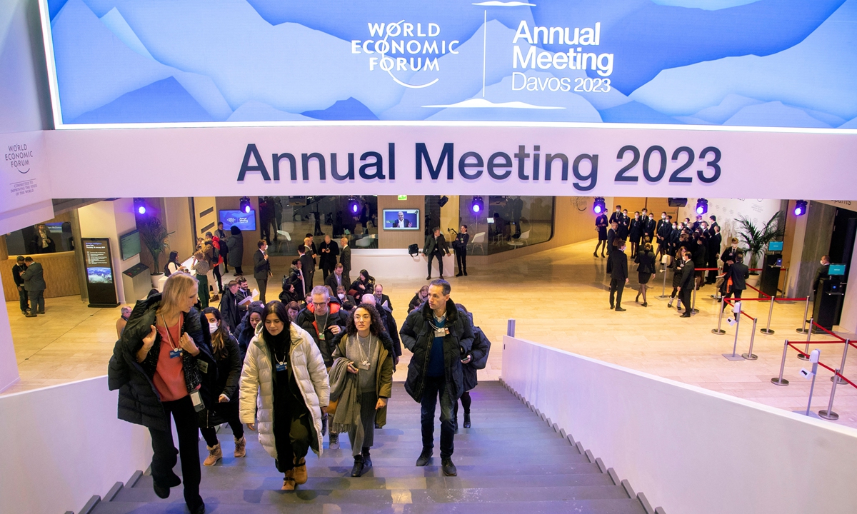 Participants of the World Economic Forum 2023 are seen in a hall at Davos Congress Centre, in the Alpine resort of Davos, Switzerland on January 16, 2023. Thousands of political, economic and social leaders from around the world gathered for the annual meeting, which kicked off on January 16. Photo: AFP
